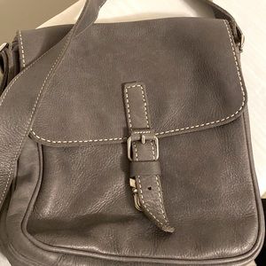 Roots over shoulder cross body leather purse